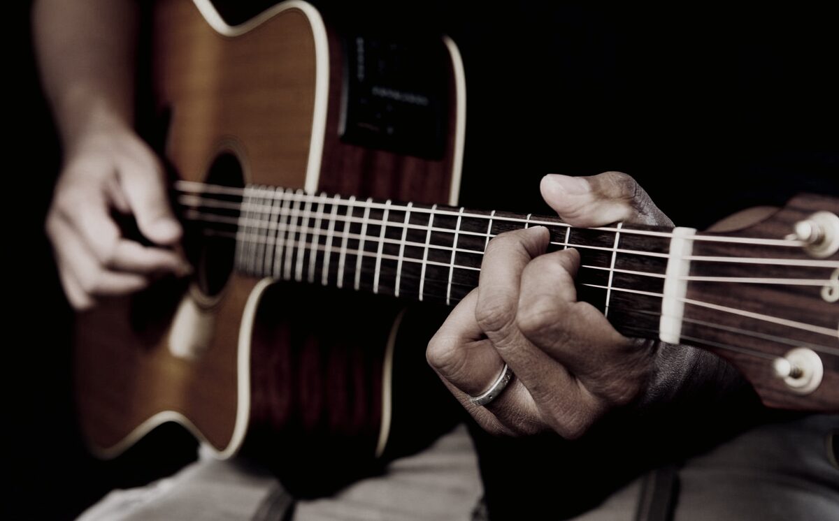 A musician playing an electric guitar
